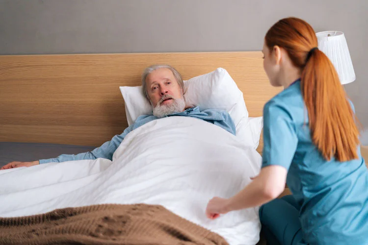 dentist visiting an old patient at home